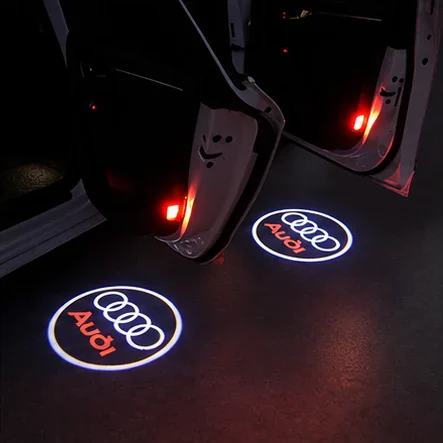 Set 2 lămpi LED cu logo Audi pentru portiere, 12 V, 64 × 25 mm